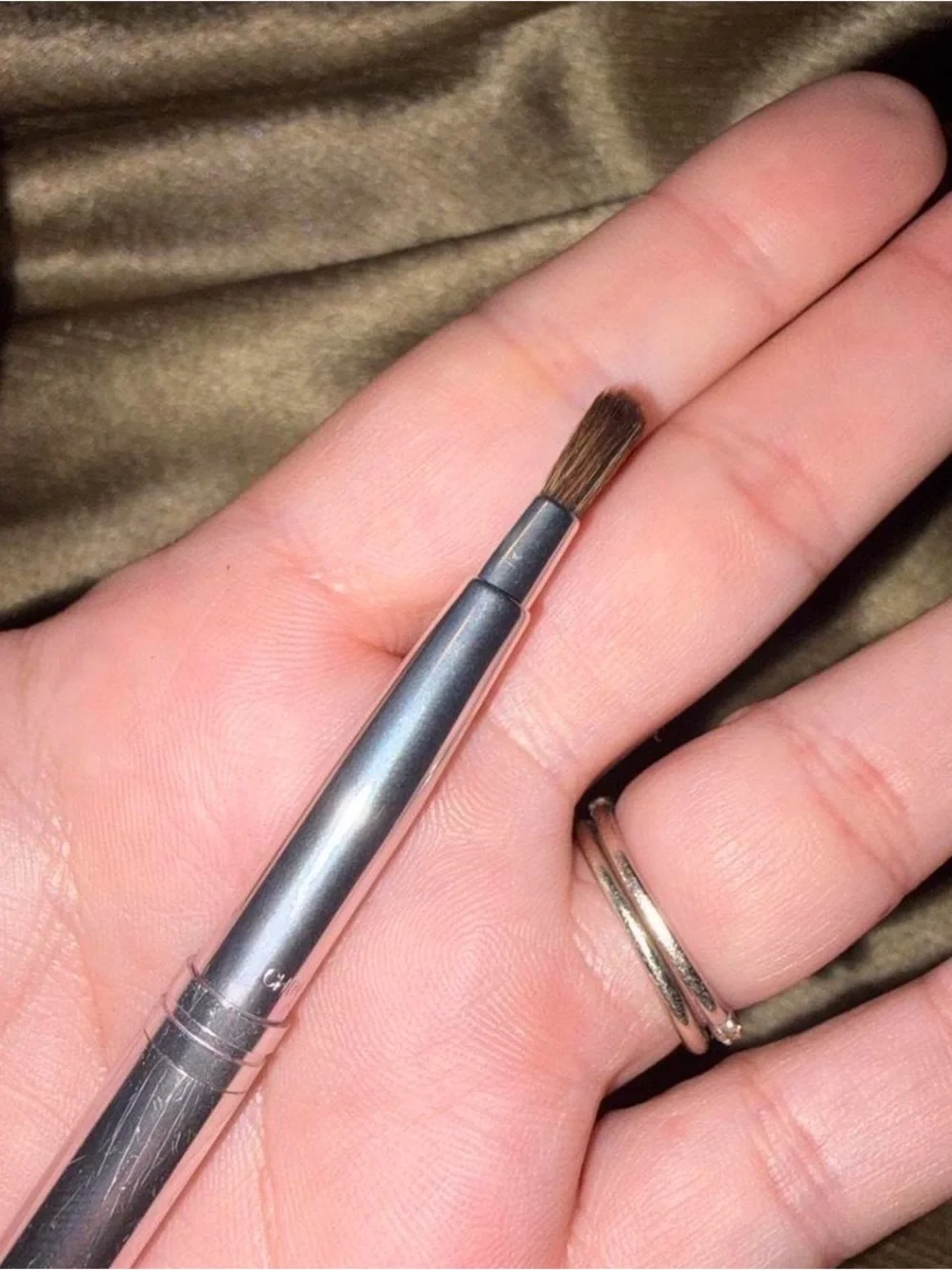 Clinique retractable brush
